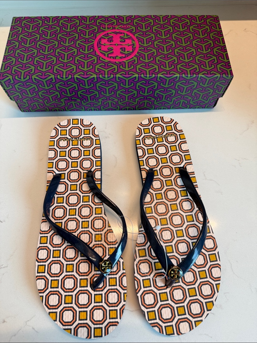 Tory Burch Navy Patent Logo-Emblem Geometric Print Flip Flops